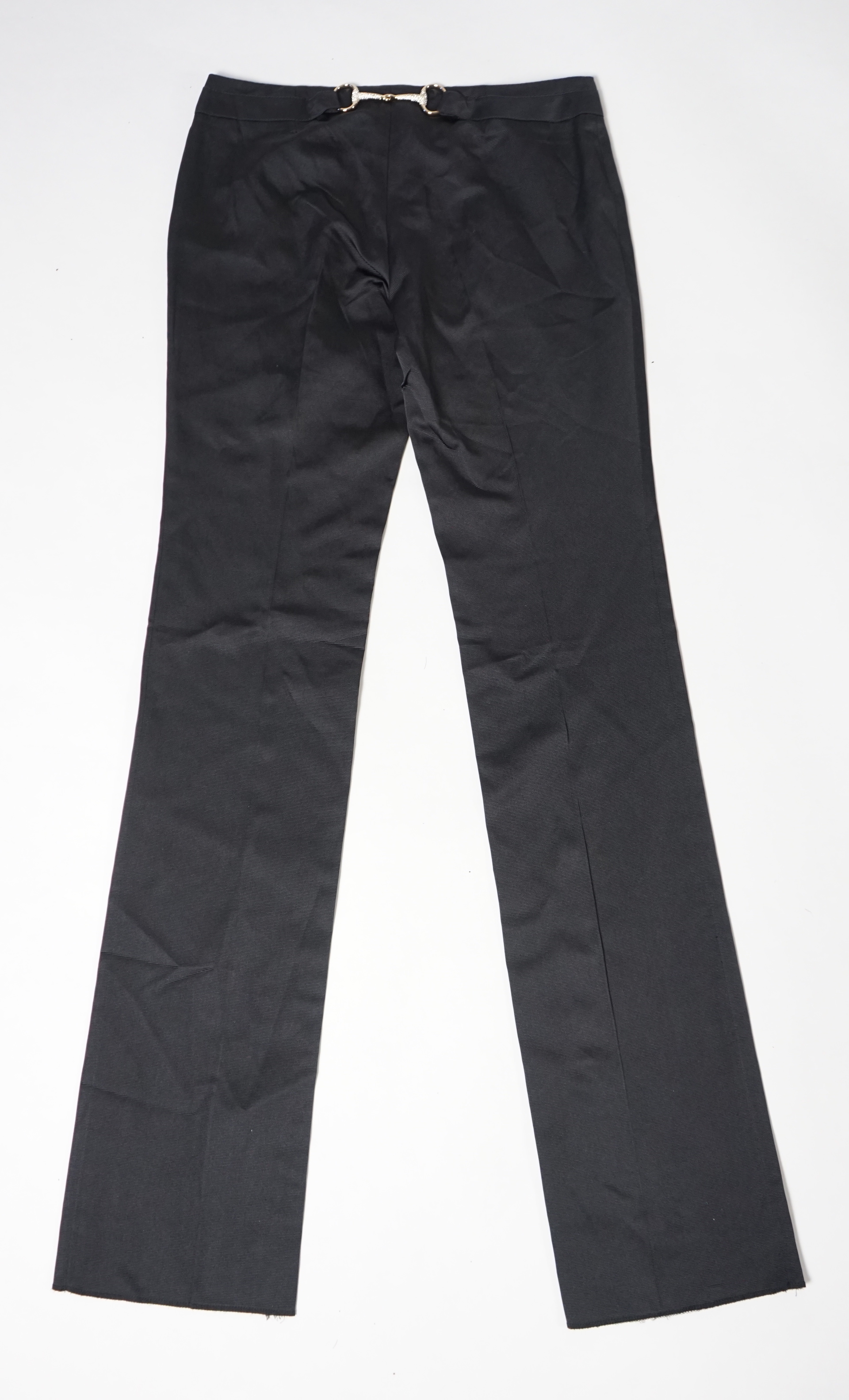 A pair of Gucci lady's textured satin trousers with gold tone diamante snaffle detail to the back and a Gucci velvet blouse, Gucci trousers: size 40, blouse size 44